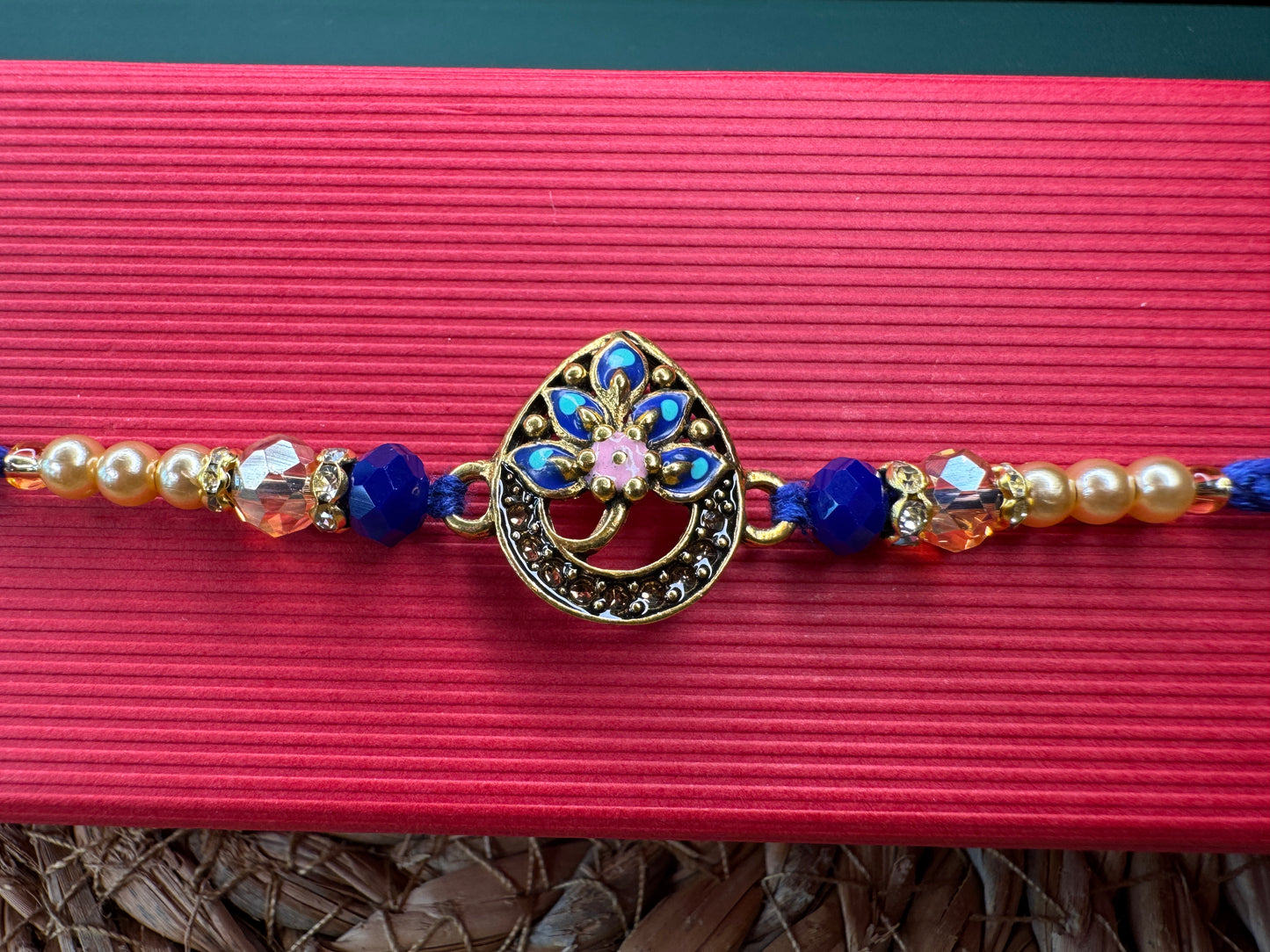 Royal Teardrop Rakhi with Kundan & Bead Detailing – Elegant & Traditional