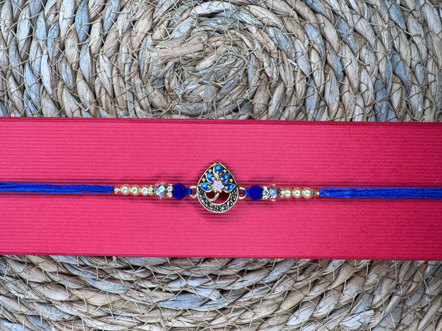 Royal Teardrop Rakhi with Kundan & Bead Detailing – Elegant & Traditional