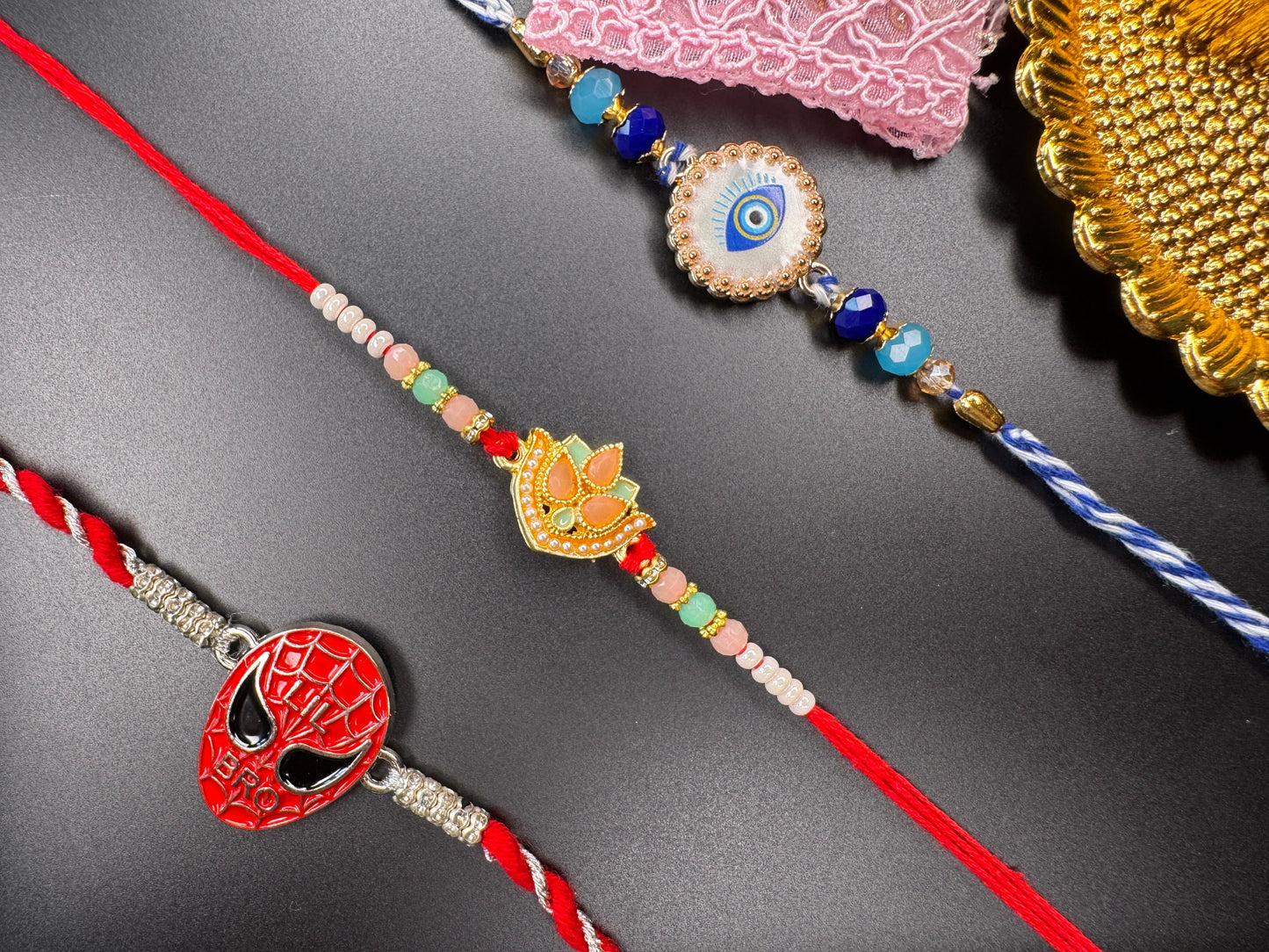 Mini Rakhi Celebration Combo – 3 Rakhis with Pooja Thali & Tikka Bag