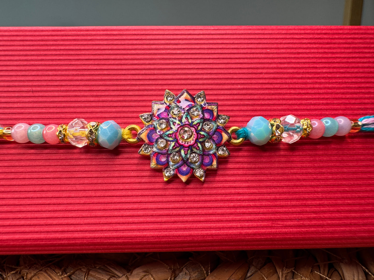 Elegant Floral Stone Rakhi – Symbol of Love & Tradition