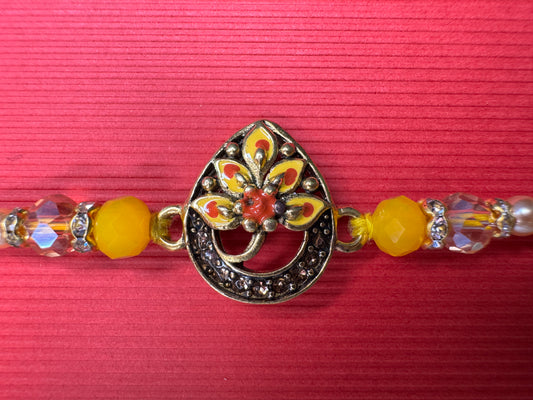 Royal Teardrop Rakhi with Kundan & Bead Detailing – Elegant & Traditional
