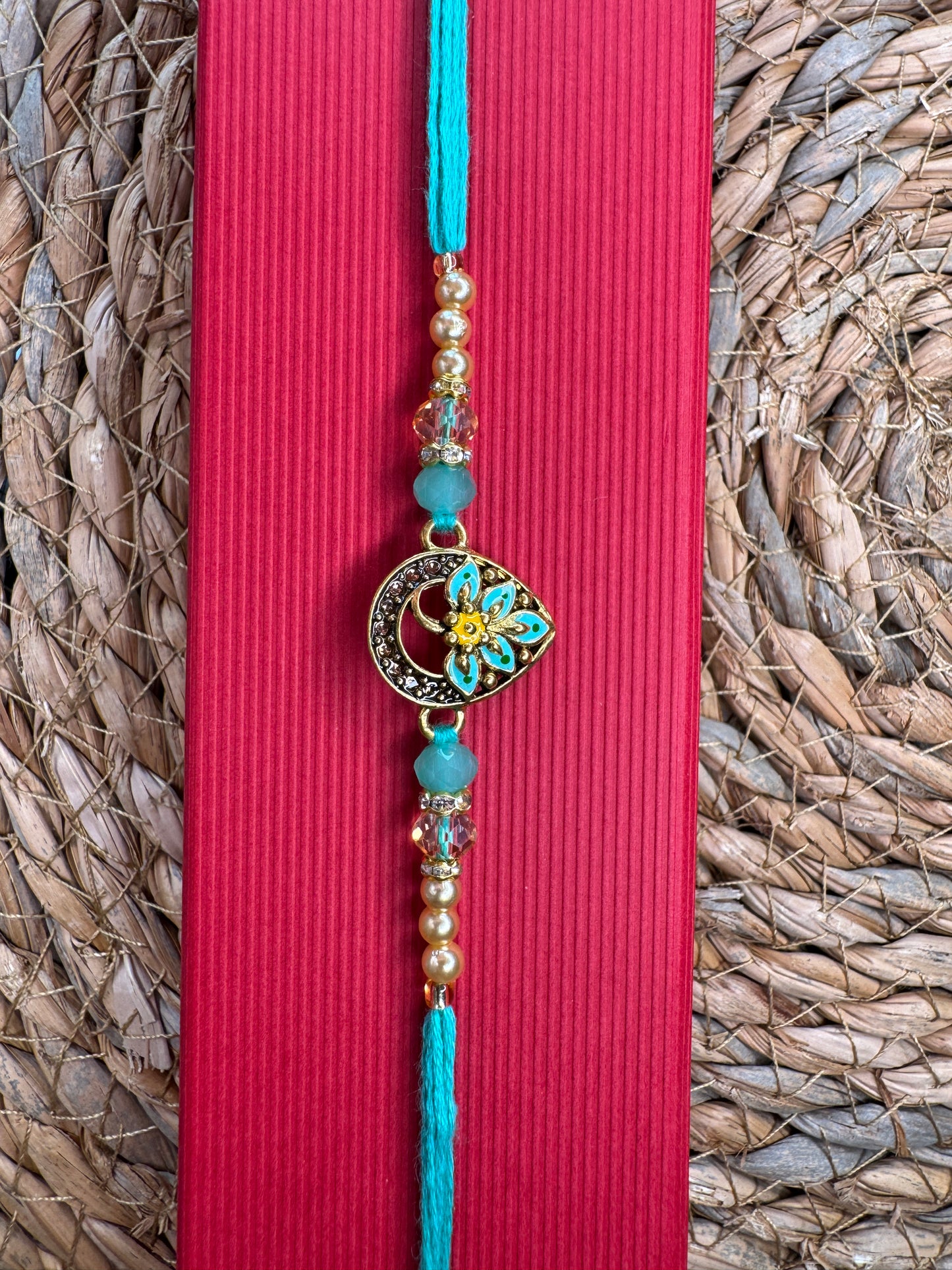 Royal Teardrop Rakhi with Kundan & Bead Detailing – Elegant & Traditional