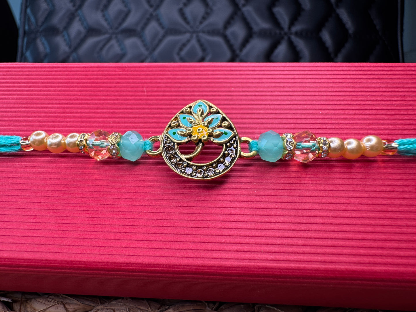 Royal Teardrop Rakhi with Kundan & Bead Detailing – Elegant & Traditional